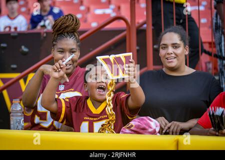 Landover, MD, USA - 21 agosto 2023 : tifosi dei Washington Commanders prima della gara di pre-stagione tra i Baltimore Ravens e i Washington Commanders a Landover, MD. Fotografo: Cory Royster Foto Stock