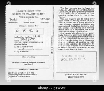 United States Selective Service System draft card from the Vietnam War era with a classification of II-S.  2-S classification indicated the registered Stock Photo