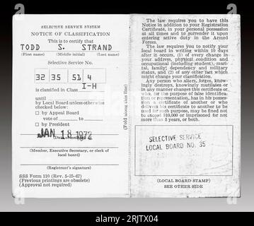 A 1972 United States Selective Service System draft card from the Vietnam War era with a classification of I-H.  Within the cessation of registrant pr Stock Photo