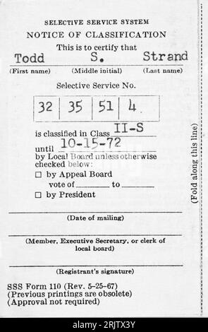 United States Selective Service System draft card from the Vietnam War era with a classification of II-S.  2-S classification indicated the registered Stock Photo