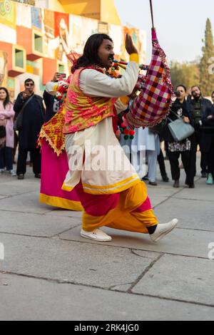 A musician wearing traditional attire during the Lok Mela festival in Islamabad, Pakistan Stock Photo