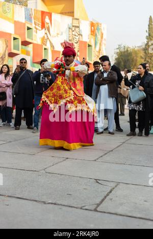 A performer wearing traditional attire during the Lok Mela festival in Islamabad Stock Photo