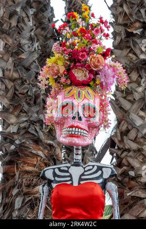 Dia de los Muertos (Day of the Dead) ornament, funny skull woman portrait isolated on white background, Halloween decor, Mexican traditional holiday Foto Stock