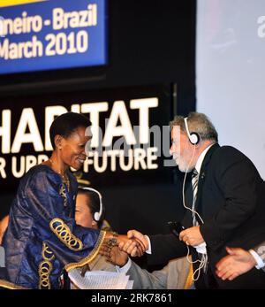 Bildnummer: 53880408  Datum: 22.03.2010  Copyright: imago/Xinhua (100322) -- RIO DE JANEIRO, March 22, 2010 (Xinhua) -- UN-Habitat Executive Director Anna Tibaijuka (L) shakes hands with Brazilian President Luiz Inacio Lula da Silva at the opening session of the 5th World Urban Forum in Rio de Janeiro, Brazil, March 22, 2010. The 5th World Urban Forum opened in Rio de Janeiro on Monday. (Xinhua/Song Weiwei) (zw) (2)BRAZIL-RIO DE JANEIRO-WORLD URBAN FORUM-OPENING PUBLICATIONxNOTxINxCHN People Politik kbdig xub 2010 quadrat premiumd xint o0 Luiz Inacio    Bildnummer 53880408 Date 22 03 2010 Copy Stock Photo