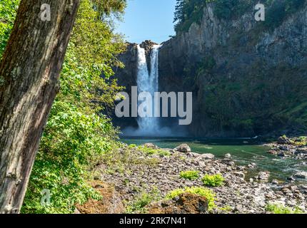 A view of Snoqualmie Falls in Washington State  from downriver. It is summertime. Stock Photo