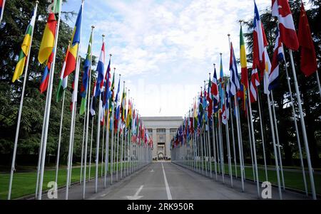 Bildnummer: 54129531  Datum: 09.06.2010  Copyright: imago/Xinhua (100609) -- GENEVA, June 9, 2010 (Xinhua) -- Flags are seen along the road to the Palace of Nations in Geneva, Switzerland, June 9, 2010. The Palace of Nations in Geneva was built between 1929 and 1936 as the headquarters of the League of Nations. It has served as the home of the United Nations Office in Geneva since 1946, when the UN secretary general signed the Headquarters Agreement with the Swiss authorities, although Switzerland did not become a UN member until 2002. (Xinhua/Yu Yang) (axy) (1)SWITZERLAND-GENEVA-THE PALACE OF Stock Photo