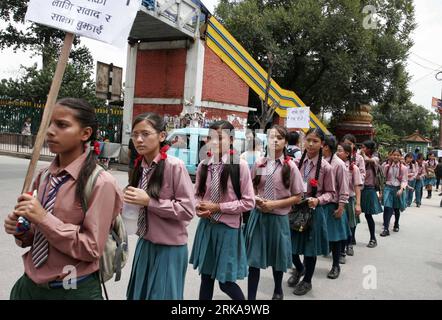 Bildnummer: 54293180  Datum: 12.08.2010  Copyright: imago/Xinhua (100812) -- KATHMANDU, Aug. 12, 2010 (Xinhua) -- Nepalese young students take part in the march to mark the International Youth Day in Kathmandu, capital of Nepal, Aug. 12, 2010. Nepal observed the International Youth Day on Thursday. On Dec. 17, 1999, the UN General Assembly endorsed the recommendation in its resolution 54/120 that August 12 be declared International Youth Day. (Xinhua/Bimal Gutam) (wh) NEPAL-INTERNATIONAL YOUTH DAY-CELEBRATIONS PUBLICATIONxNOTxINxCHN Gesellschaft Jugend Kind Jugendtag o0 Internationaler Tag der Stock Photo