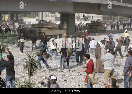 Bildnummer: 54879084  Datum: 03.02.2011  Copyright: imago/Xinhua CAIRO, Feb. 3, 2011 (Xinhua) -- Egyptian protesters are seen in and around Tahrir square, as supporters and opponents of President xHosnyxMubarakx clash in some parts of the square, Cairo, capital of Egypt, Feb. 3, 2011. Egyptian army appeared to be trying to set up a line to separate the pro-government and opposition protesters in central Cairo in a bid to curb violence, eyewitnesses said. According to opposition activists and witnesses, more from the anti-government camp were attempting to enter the square, while others were st Stock Photo