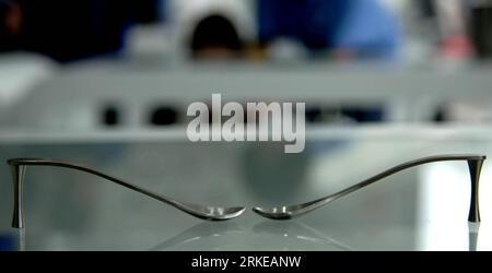 Bildnummer: 55179224  Datum: 01.04.2011  Copyright: imago/Xinhua (110401) -- HAIKOU, April 1, 2011 (Xinhua) -- Photo taken on April 1, 2011, shows a pair of spoons shaped like high-heeled shoes exhibited in Hainan International Creative Harbor in Haikou, capital of south China s Hainan Province. Hainan International Creative Harbor, Hainan s first cultural creativity industry park, opened Friday in Haikou. (Xinhua/Hou Jiansen) (llp) CHINA-HAINAN-INTERNATIONAL CREATIVE HARBOR-OPENING (CN) PUBLICATIONxNOTxINxCHN Gesellschaft kbdig xcb xo0x 2011 quer     Bildnummer 55179224 Date 01 04 2011 Copyri Stock Photo