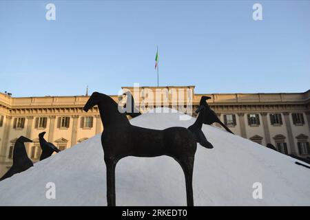 Bildnummer: 55244015  Datum: 06.04.2011  Copyright: imago/Xinhua (110407) -- MILAN, April 7, 2011 (Xinhua) -- Salt Mountain sculpture is inaugurated in the square of Duomo s cathedral in Milan, Italy, April 6, 2011. The masterpiece by Italian renowned artist Mimmo Paladino, measuring 35 meters in diameter and 10 meter high, will remain until next July in the heart of Milan, close to iconic Duomo s cathedral. (Xinhua) (jl) ITALY-MILAN-SALT MOUNTAIN PUBLICATIONxNOTxINxCHN Kultur Objekte kbdig xsk 2011 quer o0 Salzberg, Installation    Bildnummer 55244015 Date 06 04 2011 Copyright Imago XINHUA  M Stock Photo