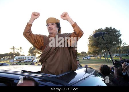 Bildnummer: 55251143  Datum: 10.04.2011  Copyright: imago/Xinhua (110410) -- TRIPOLI, April 10, 2011 (Xinhua) -- Libyan leader Muammar Gaddafi reacts in his car after meeting with the African delegation, who arrived in Libya to try to negotiate a truce between xGaddafix s forces and rebels seeking to oust him, in Tripoli, capital of Libya, April 10, 2011. (Xinhua/Hamza Turkia) LIBYA-TRIPOLI-xGADDAFIx-AFRICAN DELEGATION PUBLICATIONxNOTxINxCHN People Politik premiumd kbdig xkg 2011 quer o0 Entschlossenheit, Kampf    Bildnummer 55251143 Date 10 04 2011 Copyright Imago XINHUA  Tripoli April 10 201 Stock Photo