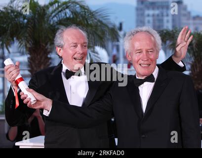 Bildnummer: 55387500  Datum: 22.05.2011  Copyright: imago/Xinhua (110522) -- CANNES, May 22, 2011 (Xinhua) -- Belgian directors Jean-Pierre Dardenne (L) and Luc Dardenne pose during a photocall after being awarded with the Grand Prize for their film The Kid with a Bike at the 64th Cannes Film Festival in Cannes, France, on May 22, 2011. The festival ended here on Sunday night. (Xinhua/Gao Jing) (wjd) FRANCE-CANNES-FILM FESTIVAL PUBLICATIONxNOTxINxCHN Kultur Entertainment People Film 64. Internationale Filmfestspiele Cannes Photocall Preisträger kbdig xkg 2011 quer Aufmacher premiumd  o0 Großer Stock Photo