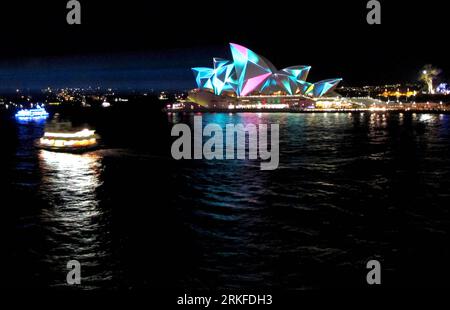 Bildnummer: 55404892  Datum: 27.05.2011  Copyright: imago/Xinhua (110528) -- SYDNEY, May 28, 2011 (Xinhua) -- The sails of the Sydney Opera House are lit during the launch of Vivid Sydney in Sydney, Australia, May 27, 2011. Vivid Sydney, a festival of light, music and ideas, will run from May 27 through June 13. (Xinhua/Tang Ming) (msq) AUSTRALIA-SYDNEY-FESTIVAL-LIGHT PUBLICATIONxNOTxINxCHN Gesellschaft Licht kbdig xmk x0x 2011 quer     Bildnummer 55404892 Date 27 05 2011 Copyright Imago XINHUA  Sydney May 28 2011 XINHUA The SAILS of The Sydney Opera House are Lit during The Launch of Vivid Sy Stock Photo