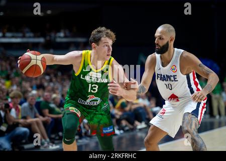 VILNIUS, LITHUANIA - august 11th 2023: FIBA World Cup 2023 tune-up game. Lithuania - France. Basketball player Rokas Jokubaitis and Evan Fournier in a Stock Photo