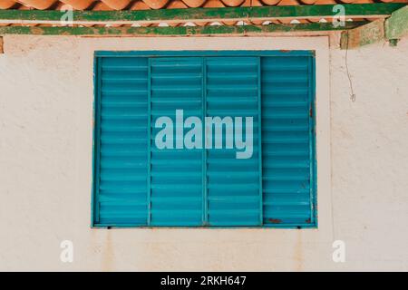 textured closed teal window background Stock Photo
