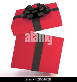 Confezione regalo rossa con nastro nero e fiocco isolato su sfondo bianco e spazio per la copia. Foto Stock