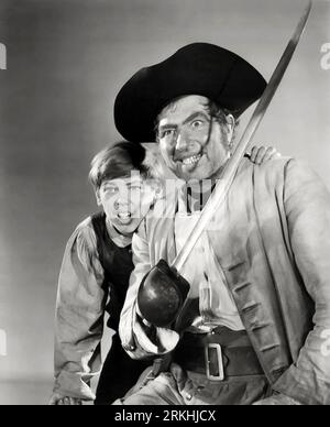 BOBBY DRISCOLL e ROBERT NEWTON in TREASURE ISLAND (1950), diretto da BYRON HASKIN. Credito: DISNEY/RKO/album Foto Stock