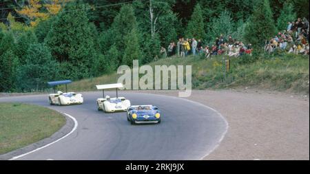 Mark Donohue stsrted 6th, finished 1st in a Lola T70,  Jim Hall started 9th, DNF  and Phil Hill started 11th, finished 2nd  in Chaparral 2Es at the 1966 Mosport Can-AM Stock Photo