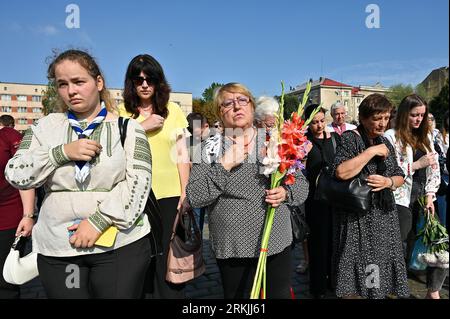 Lviv, Ukraine. 24th Aug, 2023. LVIV, UKRAINE - AUGUST 24, 2023 - Participants of the commemoration ceremony for Ukrainian defenders who died in the war with Russia, at the military cemetery in Lviv, western Ukraine. Credit: Ukrinform/Alamy Live News Stock Photo