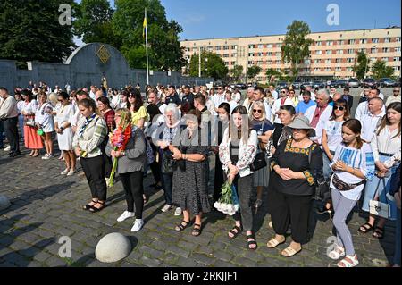 Lviv, Ukraine. 24th Aug, 2023. LVIV, UKRAINE - AUGUST 24, 2023 - Participants of the commemoration ceremony for Ukrainian defenders who died in the war with Russia, at the military cemetery in Lviv, western Ukraine. Credit: Ukrinform/Alamy Live News Stock Photo