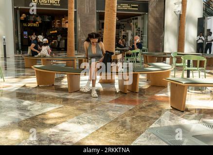 Visitors to the Brookfield Place Winter Garden  in Lower Manhattan in New York on Sunday, August 13, 2023. (© Richard B. Levine) Stock Photo