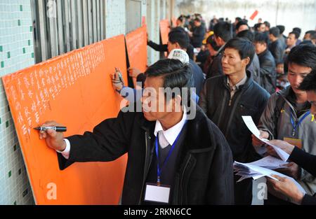 Bildnummer: 57001144  Datum: 01.02.2012  Copyright: imago/Xinhua (120201) -- GUANGZHOU, Feb. 1, 2012 (Xinhua) -- Election officials count votes during the election of an independent election committee in Wukan, south China s Guangdong Province, Feb. 1, 2012. Thousands of residents in the southern Chinese village of Wukan, known for recent massive protests regarding illegal land use and other issues, on Wednesday saw the start of an election for new leadership after former village heads were removed. An 11-member independent election committee has been formed to supervise upcoming rounds of vot Stock Photo