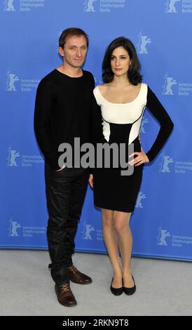 Bildnummer: 57054975  Datum: 11.02.2012  Copyright: imago/Xinhua (120211) -- BERLIN, Feb. 11, 2012 (Xinhua) -- Actor Goran Kostic (L) and actress Zana Marjanovic pose during a photocall to promote the movie In the Land of Blood and Honey by US actress and director Angelina Jolie at the 62nd Berlinale film festival in Berlin, capital of Germany on Feb. 11, 2012. (Xinhua/Ma Ning) (yt) GERMANY-BERLINALE FILM FESTIVAL-IN THE LAND OF BLOOD AND HONEY PUBLICATIONxNOTxINxCHN People Film Entertainment Kultur Film 62. Internationale Filmfestspiele Berlinale xda x0x 2012 hoch      57054975 Date 11 02 201 Foto Stock
