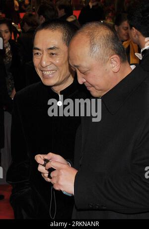 Bildnummer: 57066934  Datum: 13.02.2012  Copyright: imago/Xinhua (120214) -- BERLIN, Feb. 14, 2012 (Xinhua) -- Chinese leading director Zhang Yimou (L) attends the premiere of his film Jin ling Shi San Chai (The Flowers of War) at the 62th Berlin film festival in Berlin Feb. 13, 2012. Jin ling Shi San Chai (The Flowers of War), starring Christian Bale and Ni Ni, sets around the 1937 Nanjing massacre during the China-Japan war. The film is screened at the 62th Berlin film festival out  (Xinhua/Ma Ning) GERMANY-BERLIN-62TH BERLIN FILM FESTIVAL PUBLICATIONxNOTxINxCHN Kultur Entertainment People F Stock Photo