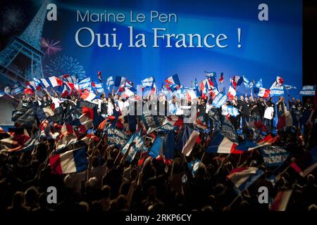Bildnummer: 57910940  Datum: 17.04.2012  Copyright: imago/Xinhua (120418) -- PARIS, April 18, 2012 (Xinhua) --French presidential candidate and leader of the National Front (FN) Marine Le Pen sings the marseillaise with some of her supporters on stage at the Zenith of Paris during a rally in Paris, France, April 17, 2012. Last polls place her third only a few days before the French presidential elections. (Xinhua/Etienne Laurent) FRANCE-PARIS-FN-LE PEN-CAMPAIGN PUBLICATIONxNOTxINxCHN People Politik xda x0x premiumd Wahl Wahlkampf Präsidentschaftswahl 2012 quer      57910940 Date 17 04 2012 Cop Stock Photo
