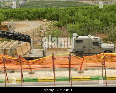 Bildnummer: 57947632  Datum: 01.05.2012  Copyright: imago/Xinhua (120502) -- BEIRUT, May 2, 2012 (Xinhua) -- Israeli military vehicles patrol the Lebanese-Israeli border, as seen from the border village of Lebanon, May 1, 2012. Israel began building a wall on Monday along its border with Lebanon, saying the barrier was necessary to boost security for an Israeli frontier town across from a Lebanese village. (Xinhua) (zgp) LEBANON-ISRAEL-SECURITY-BORDER-WALL PUBLICATIONxNOTxINxCHN Politik Nahostkonflikt Grenze Mauer Mauerbau Bau Grenzanlagen xjh x0x premiumd 2012 quer      57947632 Date 01 05 20 Stock Photo