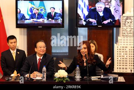 (120625) -- BUENOS AIRES, June 25, 2012 (Xinhua) -- Chinese Premier Wen Jiabao (L Front) attends a video conference with leaders of the South American Common Market (Mercosur) including Argentine President Cristina Fernandez de Kirchner (R), Brazilian President Dilma Rousseff (on left screen) and Uruguayan President Jose Mujica (on right screen), in Buenos Aires, capital of Argentina, June 25, 2012. (Xinhua/Yao Dawei) (ly) ARGENTINA-CHINA-WEN JIABAO-VIDEO CONFERENCE PUBLICATIONxNOTxINxCHN   Buenos Aires June 25 2012 XINHUA Chinese Premier Wen Jiabao l Front Attends a Video Conference With Lead Stock Photo