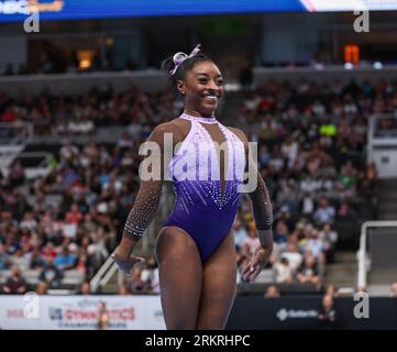 25 agosto 2023: Simone Biles sorride durante la sua routine al Woman's Day 1 del 2023 U.S. Gymnastics Championships alla SAP Arena di San Jose, CALIFORNIA. Kyle Okita/CSM (immagine di credito: © Kyle Okita/Cal Sport Media) credito: Cal Sport Media/Alamy Live News Foto Stock