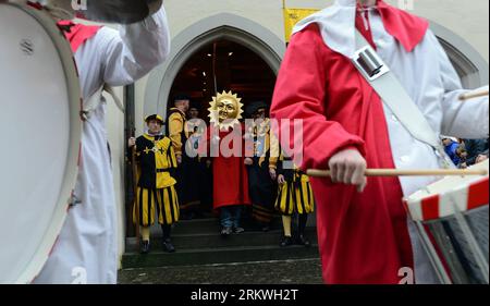 GENEVA, Nov. 11, 2012 - A contestant proceeds before Gansabhauet in Sursee, Nov. 11, 2012. Gansabhauet cutting down the goose from a rope was held in the town of Sursee near Lucerne, central Switzerland on Sunday to celebrate the St. Martin s Day. Xinhua/Wang Siwei SWITZERLAND-SURSEE-GANSABHAUET PUBLICATIONxNOTxINxCHN Stock Photo
