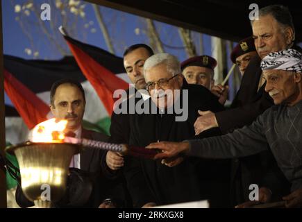 Bildnummer: 58958898  Datum: 31.12.2012  Copyright: imago/Xinhua (121231) -- RAMALLAH, Dec. 31, 2012 (Xinhua) -- Palestinian President Mahmoud Abbas (C) lights a flame during celebrations of the 48th anniversary of the Fatah movement in the West Bank city of Ramallah on Dec. 31, 2012. (Xinhua/Fadi Arouri) MIDEAST-RAMALLAH-FATAH-ABBAS PUBLICATIONxNOTxINxCHN People Politik xdp x0x premiumd 2013 quer premiumd      58958898 Date 31 12 2012 Copyright Imago XINHUA  Ramallah DEC 31 2012 XINHUA PALESTINIAN President Mahmoud Abbas C Lights a Flame during celebrations of The 48th Anniversary of The Fata Stock Photo