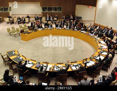 Bildnummer: 59120717  Datum: 22.01.2013  Copyright: imago/Xinhua (130122) -- NEW YORK, Jan. 22, 2013 (Xinhua) -- Representatives of members of the United Nations Security Council vote during a Security Council meeting at the UN headquarters in New York, the United States, Jan. 22, 2013. The UN Security Council on Tuesday condemned the satellite launch on Dec. 12 by the Democratic People s Republic of Korea (DPRK), saying that Pyongyang used ballistic missile technology and was in violation of resolutions 1718 (2006) and 1874 (2009). (Xinhua/Shen Hong) US-UN-DPRK-SATELLITE LAUNCH-RESOLUTION PUB Stock Photo