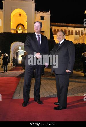 Bildnummer: 59153934  Datum: 30.01.2013  Copyright: imago/Xinhua (130130) -- ALGIERS, Jan. 30, 2013 (Xinhua) -- Algerian President Abdelaziz Bouteflika welcomes British Prime Minister David Cameron in the Palais du Peuple office, in Algiers, Jan 30, 2013. David Cameron arrived on Wednesday in Algiers to discuss ways of boosting bilateral ties, including regional and international issues of common interest between the United Kingdom and Algeria. (Xinhua/Mohamed Kadri) ALGERIA-ALGEIERS-UK-VISIT PUBLICATIONxNOTxINxCHN People Politik premiumd x0x xsk 2013 hoch      59153934 Date 30 01 2013 Copyrig Stock Photo