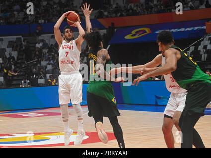 Jakarta, Indonesia. 26th Aug, 2023. Navid Rezaeifar (1st L) of Iran shoots during the Group G first round match between Iran and Brazil at the FIBA World Cup 2023 in Jakarta, Indonesia, Aug. 26, 2023. Credit: Zulkarnain/Xinhua/Alamy Live News Stock Photo