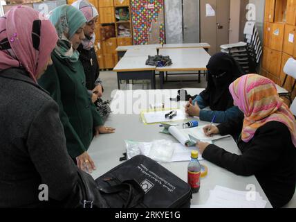 Bildnummer: 59205520  Datum: 11.02.2013  Copyright: imago/Xinhua (130211) -- GAZA, Feb. 11, 2013 (Xinhua) -- Palestinian women register their names at a voter registration center in Rafah City, southern Gaza Strip, on Feb. 11, 2013. Voter registration stations opened Monday in the Palestinian territories, including the Gaza Strip for the first time since Islamic Hamas movement seized control of the area in 2007. (Xinhua/Wissam Nassar)(ctt) MIDEAST-GAZA-UPDATE-VOTER-REGISTRATION PUBLICATIONxNOTxINxCHN Gesellschaft Politik Wahl Registrierung Wählerregistrierung premiumd x2x xrj 2013 quer  o0 Pal Stock Photo