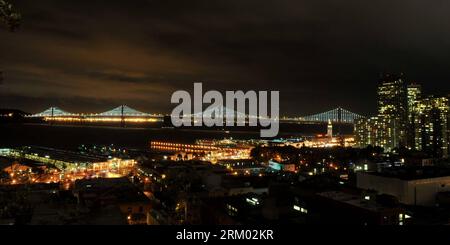 Bildnummer: 59309201  Datum: 05.03.2013  Copyright: imago/Xinhua SAN FRANCISCO -- Photo taken on March 5, 2013 shows the San Francisco-Oakland Bay Bridge illuminated by some 25,000 LED lights in San Francisco, the United States. A lighted art display named Bay Lights will decorate the San Francisco-Oakland Bay Bridge every night for the next two years. (Xinhua/Liu Yilin) (lyx) U.S.-SAN FRANCISCO-BAY BRIDGE-BAY LIGHTS PUBLICATIONxNOTxINxCHN Gesellschaft Brücke Beleuchtung Kunst Installation x0x xdd 2013 quer     59309201 Date 05 03 2013 Copyright Imago XINHUA San Francisco Photo Taken ON March Stock Photo