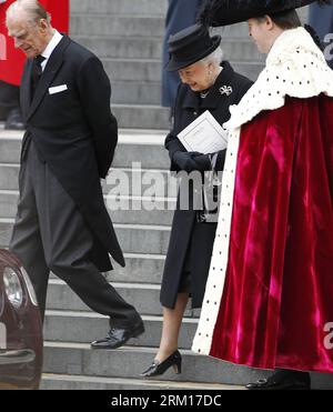 Bildnummer: 59530905  Datum: 17.04.2013  Copyright: imago/Xinhua (130417) -- LONDON, April 17, 2013 (Xinhua) -- Queen Elizabeth II and prince Philip leave St. Paul s Cathedral following the ceremonial funeral service of former British Prime Minister Margaret Thatcher in London, Britain, April 17, 2013. The funeral of Margaret Thatcher, the first female British prime minister, started 11 a.m. local time on Wednesday in London. (Xinhua/Yin Gang) (ybg) BRITAIN-LONDON-THATCHER-FUNERAL PUBLICATIONxNOTxINxCHN People Politik Gedenken Trauer Beerdigung Trauerfeier premiumd x1x xmb 2013 quadrat o0 Fami Stock Photo