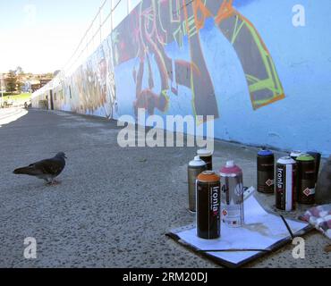 Bildnummer: 59659268  Datum: 17.05.2013  Copyright: imago/Xinhua (130517) -- SYDNEY, May 17, 2013 (Xinhua) -- A dove stops in front of the Chloe Memorial Mural on the Bondi Beach in Sydney, Australia, May 17, 2013. The 15-year-old Chloe Byron was one of the 202 victims of the Bali bombing on Oct. 12, 2002. With the support of Chloe s family, local aerosol artists completed the Chloe Memorial Mural on the beach where she grew up in memory of Chloe and other victims. The local council have commissioned the artists to recreate the murals which are in need of repair. (Xinhua/Jin Linpeng) AUSTRALIA Stock Photo