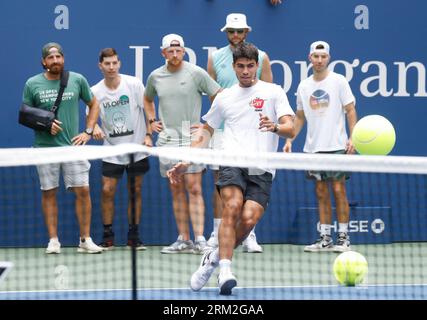 Flushing Meadow, United Stated. 26th Aug, 2023. Carlos Alcaraz of Spain participates in Arthur Ashe Kids Day with Dude Perfect leading up to the 2023 US Open Tennis Championships in at the USTA Billie Jean King National Tennis Center on Saturday, August 26, 2023 in New York City. Photo by John Angelillo/UPI Credit: UPI/Alamy Live News Stock Photo