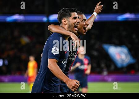 Paris, France. 26th Aug, 2023. Marco Asensio of PSG celebrate his goal with Kylian Mbappe of PSG during the Ligue 1 Uber Eats match between Paris Saint-Germain and RC Lens played at Parc des Princes Stadium on August 26 in Paris, France. (Photo by Matthieu Mirville/PRESSINPHOTO) Credit: PRESSINPHOTO SPORTS AGENCY/Alamy Live News Stock Photo