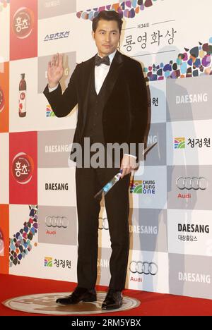 Bildnummer: 60743424 Datum: 22.11.2013 Copyright: imago/Xinhua (131122) -- SEOUL, 22 novembre 2013 (Xinhua) -- l'attore sudcoreano Jung Woo-sung posa durante un evento sul Red carpet al 34° Blue Dragon Film Awards a Seoul, capitale della Corea del Sud, 22 novembre 2012. (Xinhua/Park Jin-hee)(hy) COREA DEL SUD-SEOUL-BLUE DRAGON FILM AWARDS PUBLICATIONxNOTxINxCHN People xas x0x 2013 hoch Foto Stock