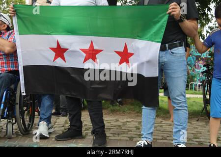 Le proteste siriane a Lipsia in Germania condannano le azioni del regime. Sostenere il movimento popolare nel sud della Siria, con particolare attenzione a Suwayda Foto Stock