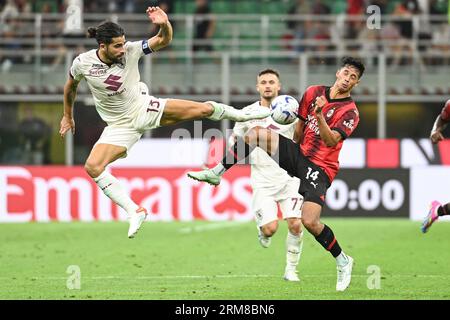 Milano, Italia. 26 agosto 2023. Ricardo Rodriguez (Torino FC) in azione contro Tijjani Reijnders (AC Milan) durante l'AC Milan vs Torino FC, partita di serie A di Milano, Italia, agosto 26 2023 credito: Agenzia fotografica indipendente/Alamy Live News Foto Stock