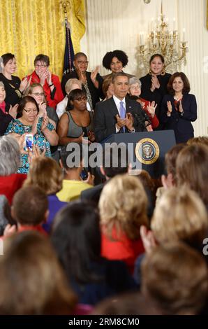 (140408) -- WASHINGTON, 8 aprile 2014 (Xinhua) -- il presidente degli Stati Uniti Barack Obama parla prima di firmare un memorandum Advancing Pay Equality for Women in the White House in Washington D.C., 8 aprile 2014. (Xinhua/Yin Bogu) U.S.-WASHINGTON-OBAMA-EQUAL PAY PUBLICATIONxNOTxINxCHN Washington 8 aprile 2014 XINHUA il presidente degli Stati Uniti Barack Obama parla prima di firmare un Memorandum Advancing Pay EQUALITY for Women in the White House in Washington D C 8 aprile 2014 XINHUA Yin Bogu U S Washington Obama EQUAL Pay PUBLICATIONxNOTxINxCHN Foto Stock