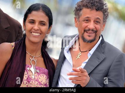 (140515) -- CANNES, 15 maggio 2014 (Xinhua) -- l'attore Abel Jafri e l'attrice Toulou Kiki si pongono durante una photocall per il film TIMBUKTU al 67° Festival di Cannes, in Francia, 15 maggio 2014. (Xinhua/Chen Xiaowei) (jl) FRANCE-CANNES-FILM FESTIVAL-TIMBUKTU PUBLICATIONxNOTxINxCHN Cannes 15 maggio 2014 XINHUA attore Abel e attrice Kiki posa durante un Photo call per il Film Timbuktu AL 67° Festival di Cannes Francia 15 maggio 2014 XINHUA Chen Xiaowei JL France Cannes Film Festival Timbuktu PUBLINTXINTIXINTIXINTIXINTIXINTIXINTIONCHN Foto Stock