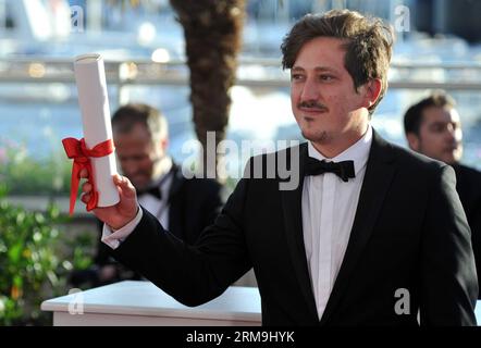 (140524) -- CANNES, 24 maggio 2014 (Xinhua) -- il regista Simon Mesa Soto presenta Short Films Palme d o del 67° Festival di Cannes per il suo film Leidi, a Cannes, Francia, 24 maggio 2014.(Xinhua/Chen Xiaowei) FRANCE-CANNES-FILM FESTIVAL-AWARDS PUBLICATIONxNOTxINxCHN Cannes 24 maggio 2014 XINHUA regista Simon Mesa Soto presenta Short Films Palme D o del 67° Festival di Cannes per il suo Film a Cannes Francia 24 maggio 2014 XINHUA Chen Xiaowei France Cannes Film Festival Awards PUBLICATIONxNOTxINxCHN Foto Stock