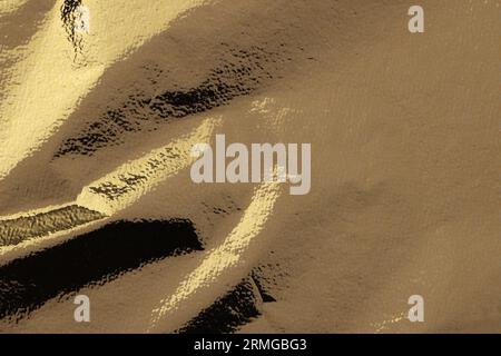 Foglio d'oro commestibile come sfondo, primo piano Foto Stock